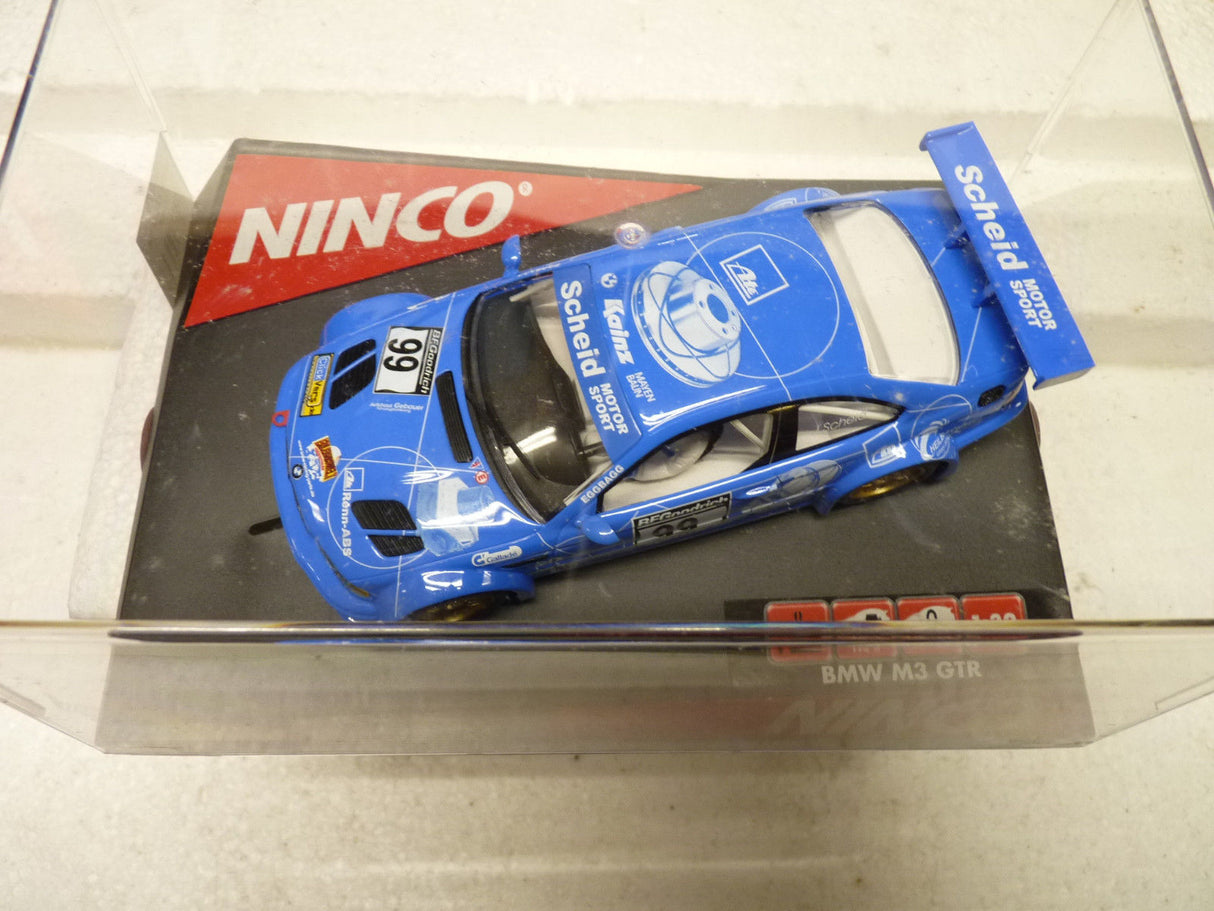 Blue slot car of a BMW M3 GTR with "Scheid" branding for Ninco 50279