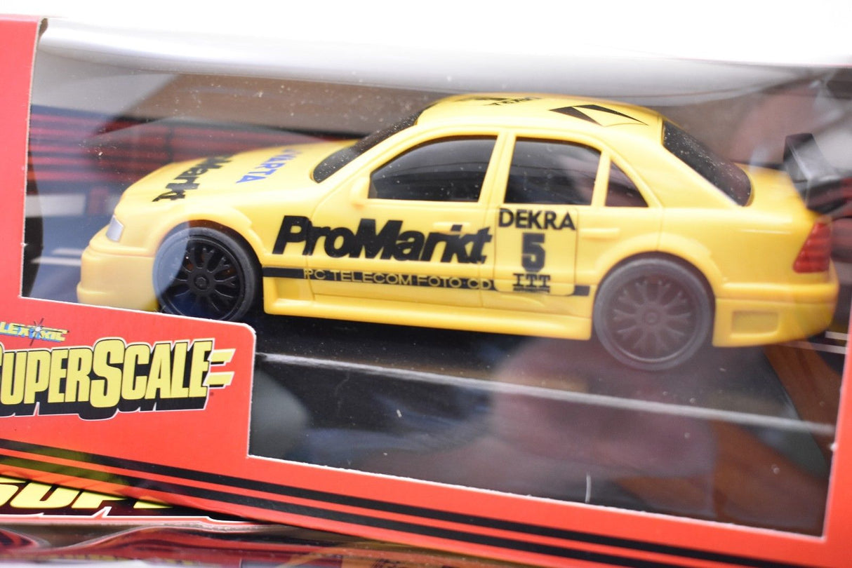 Yellow Mercedes AMG C-Class model car with "ProMarit 5" decal for Superscale Scalextric 699