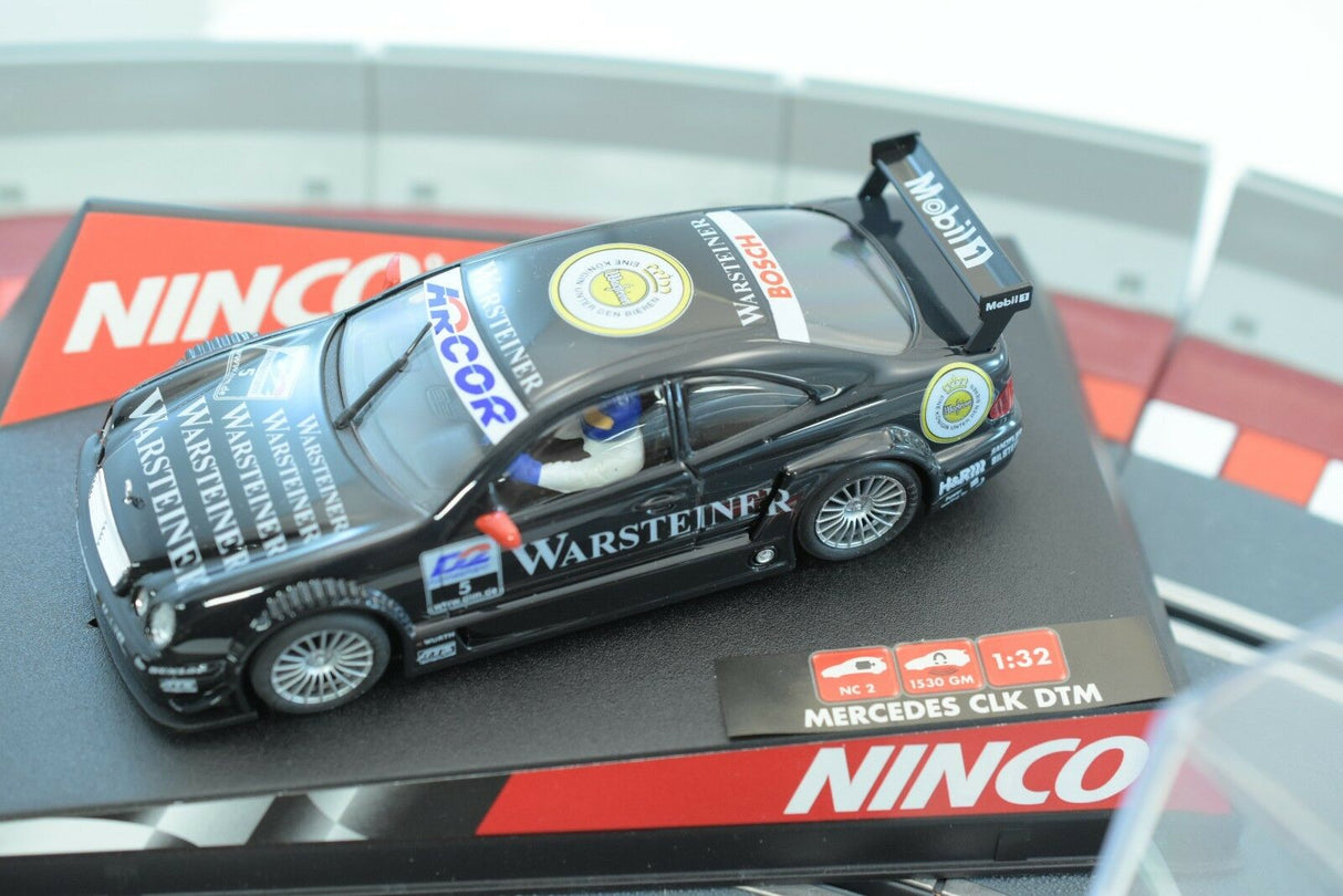 Black Mercedes race car model on a track mat for ZZ Expired Kim Collection 50253