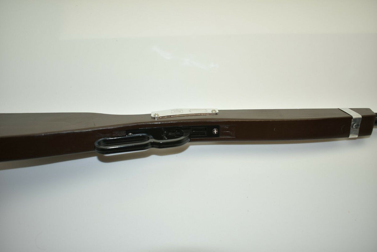 Brown wooden saddle gun with die-cast barrel and trigger mechanism for 2700