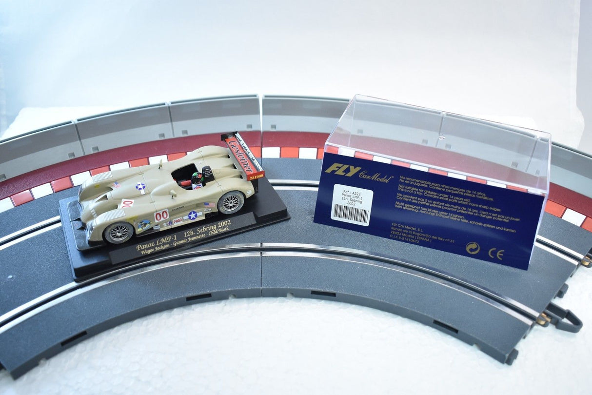 Model race car on track with product information card for Fly Car A222