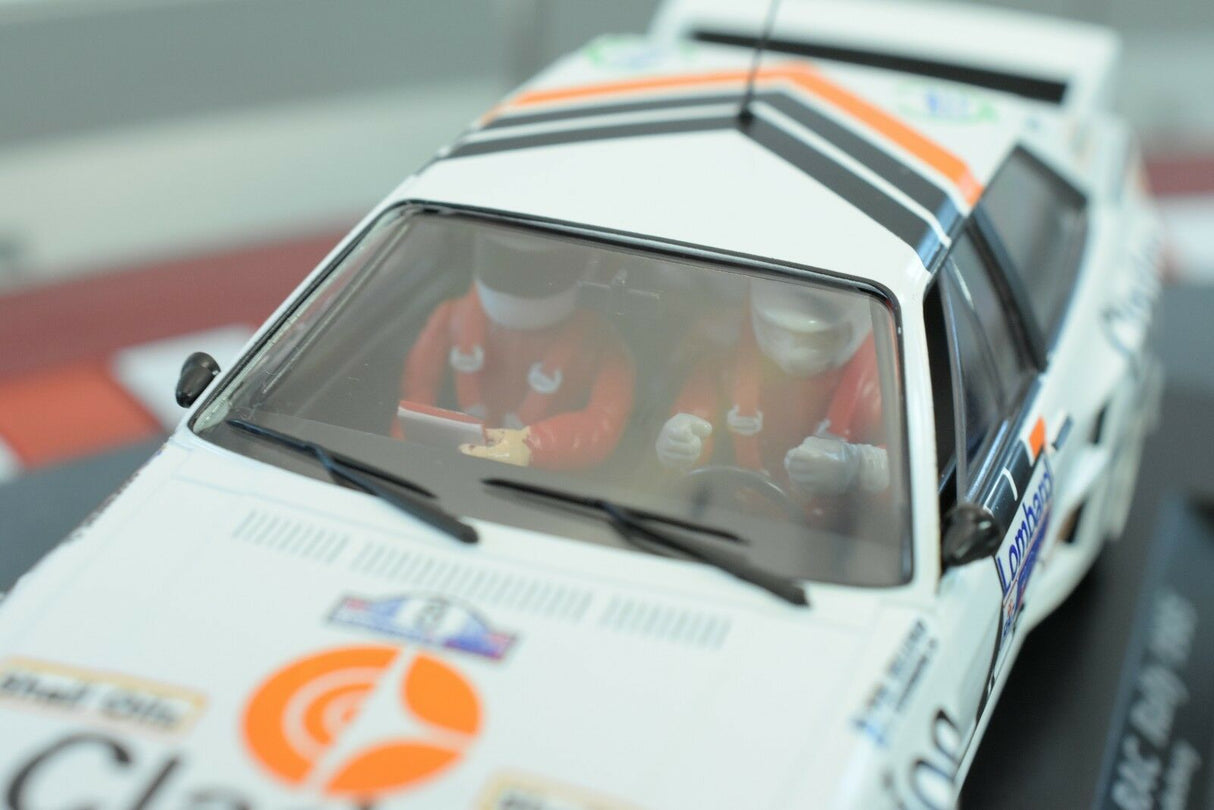 Miniature rally car with two figures visible inside the cockpit for Fly Car 88285