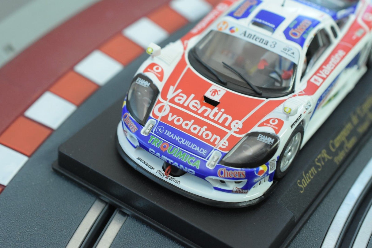 Red and white race car model on a track base for Fly Car 88026
