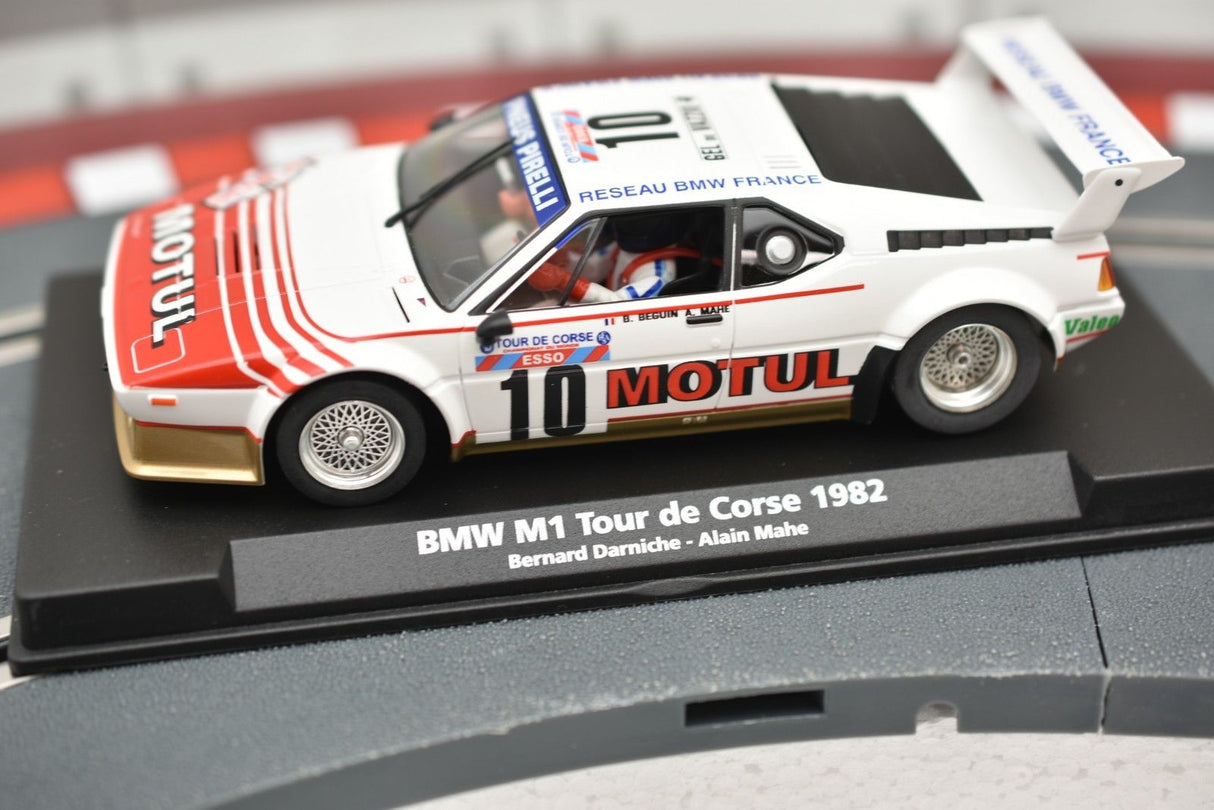 Model car of a 1982 BMW M1 race car on a display base for Fly Car 88180