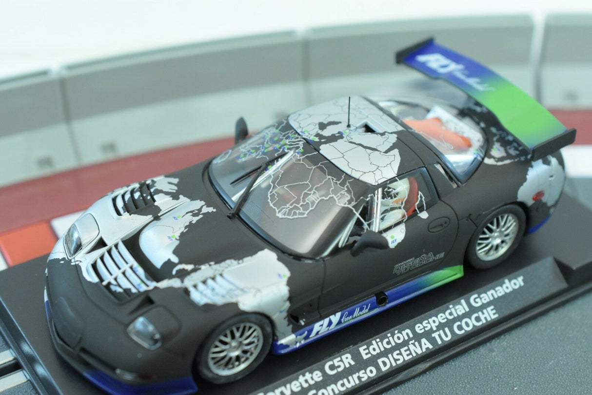 Black Corvette race car model with world map graphic on hood for Fly Car 99026