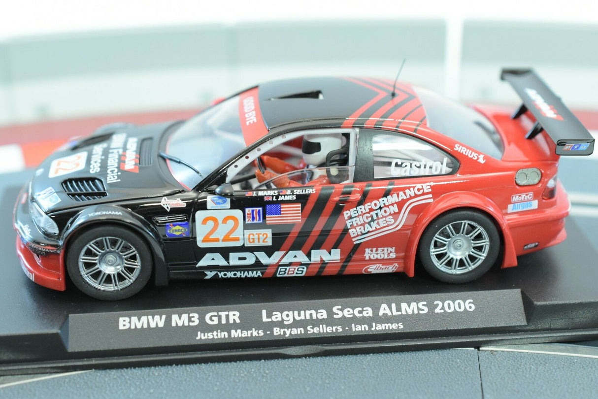 Red BMW M3 GTR race car model on a display base for Fly Car 88266, rear view