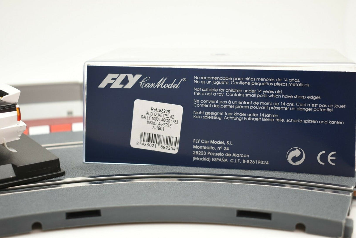 Product box for Audi Quattro A2 model car, showing safety warnings and details for Fly Car 88226