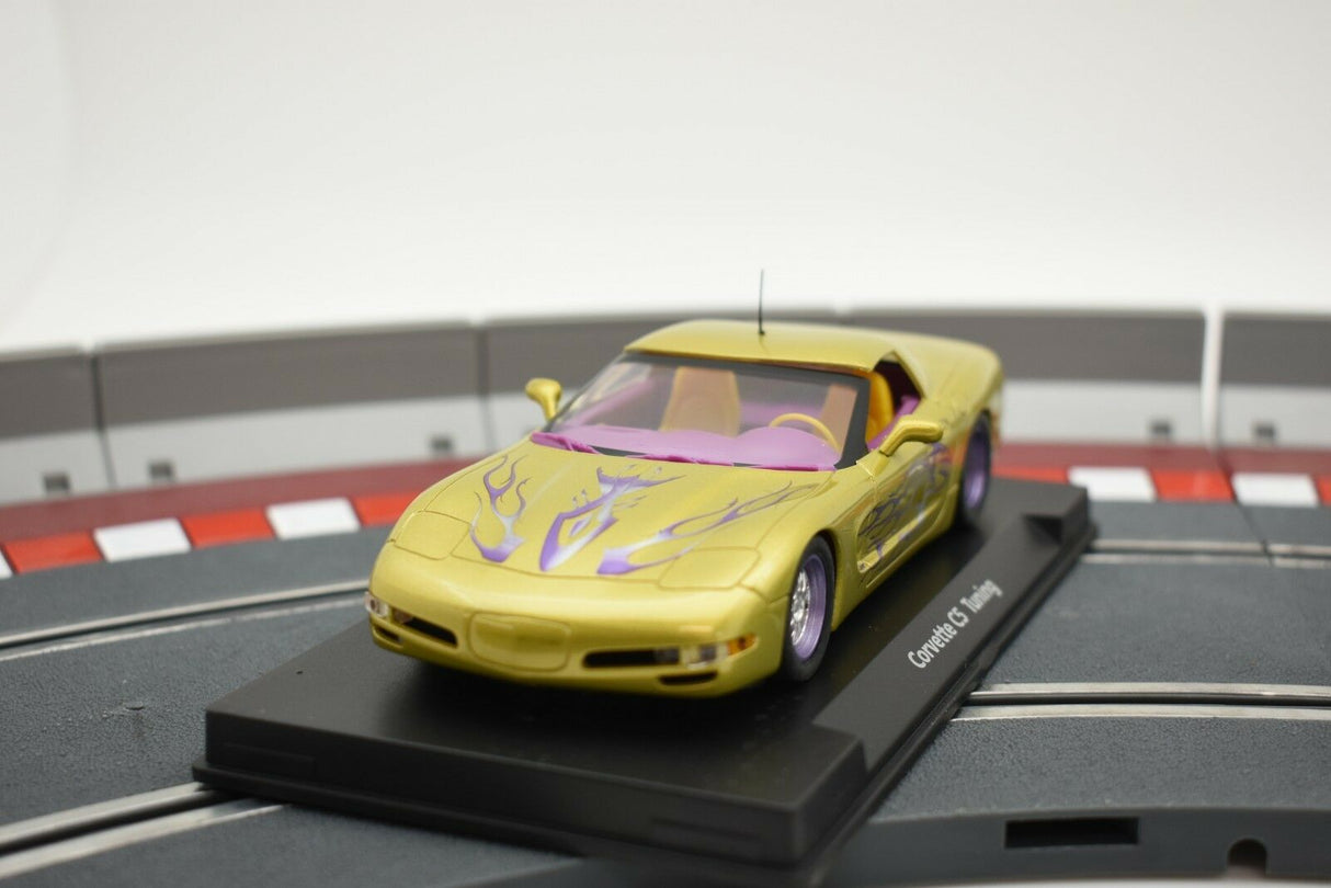 Yellow Corvette C5 model car on a track base for Fly Car 07052