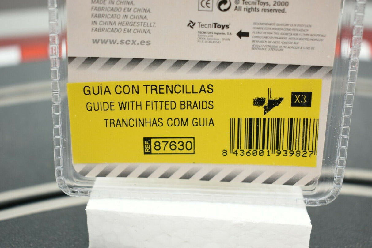 Yellow packaging showing "Guide with Fitted Braids" and reference number 87630 for SCX