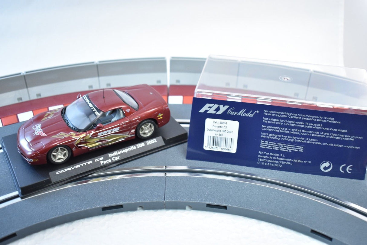 Red Corvette race car model on a track section for Fly Car 88068, alternate track view