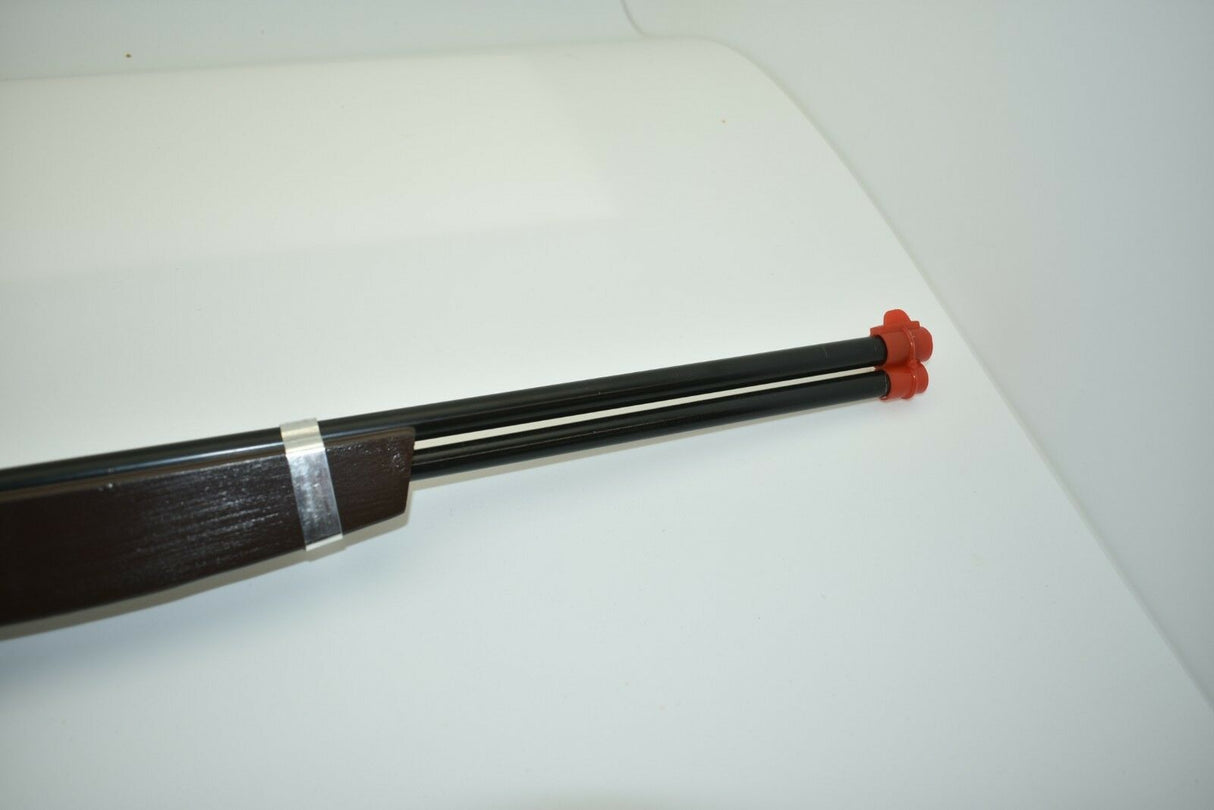 Revolver with wood grip and orange pommel, displayed on white surface for Die Cast Barrel and Trigger 2700
