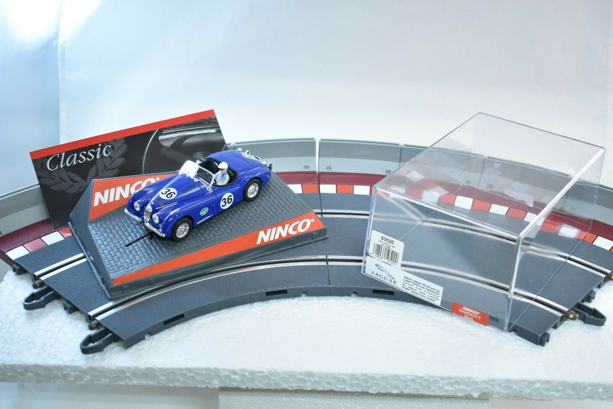 Blue Jaguar slot car on a track section with "Classic NINCO" branding for ZZ Expired Kim Collection 50520