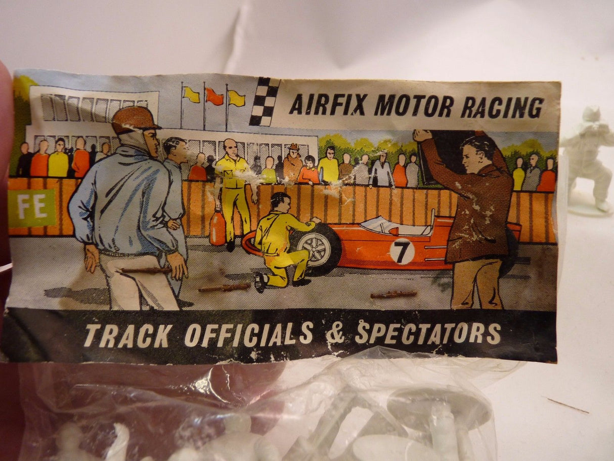 Miniature figures: track officials and spectators at a motor racing scene for AIRFIX