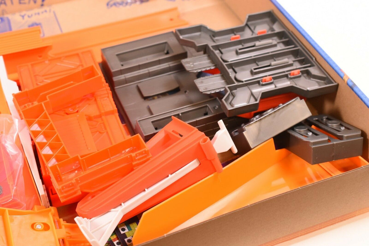 Hot Wheels track building system components in an open box for Mattel DWW97