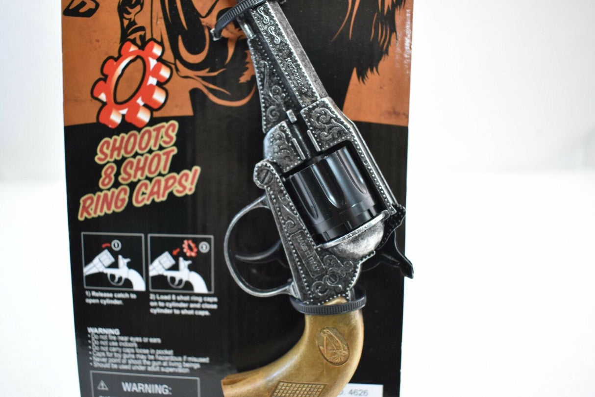 Black revolver with a brown background showing loading instructions for Parris Toys 4626