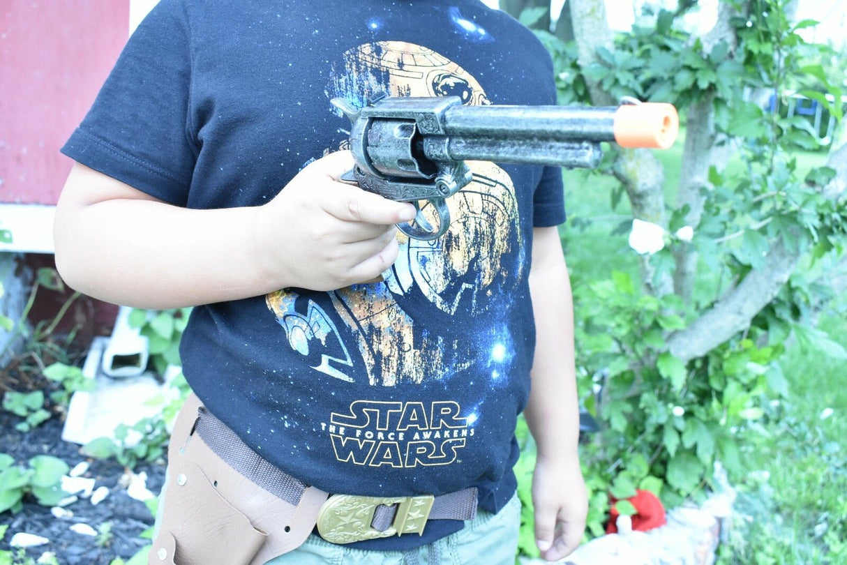 Boy holding a toy blaster pistol and wearing a holster for Parris Toys 4603C
