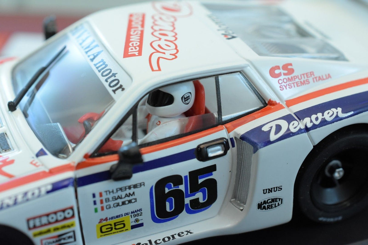 Race car model, white and blue, with "Denver" and "65" visible for Fly Car 07501