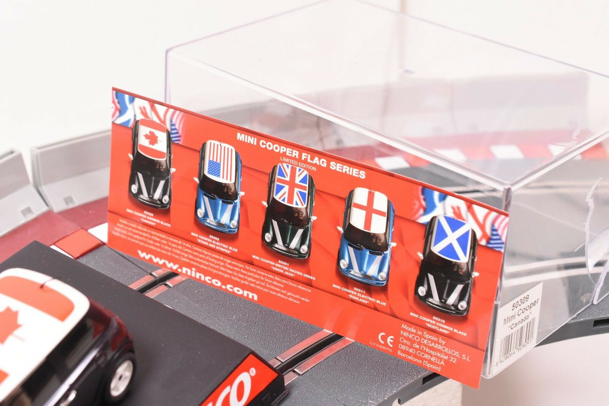 Mini Cooper slot car with various national flag decals for REH Ninco 50309