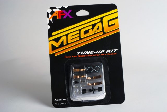 Mega G Tune-Up Kit for race cars, containing various small metal parts for AFX/Racemasters 70330