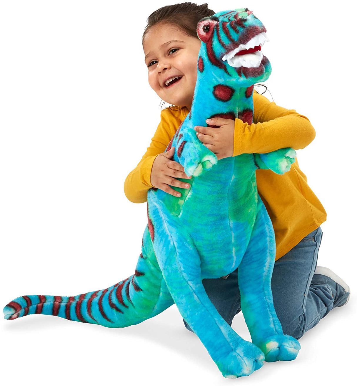 Girl hugging a bright blue, plush T-Rex toy for Melissa and Doug 2149