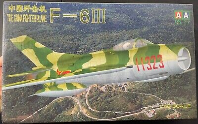 Green and yellow Chinese F-6 III fighter plane model on a diorama background for AA Model Z-F 0011