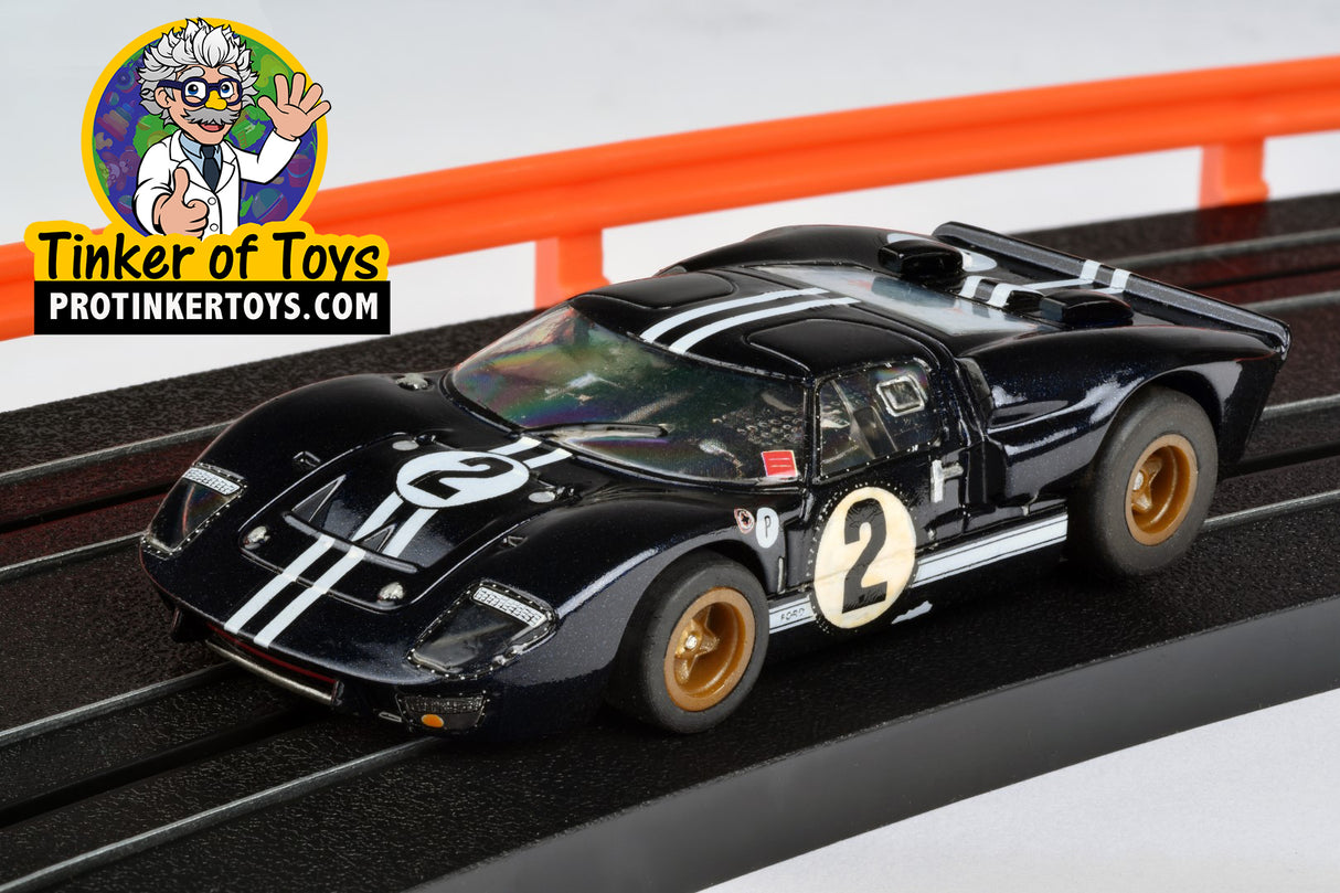 Black Ford GT40 race car model with white racing stripes and number 2 for AFX/Racemasters 22031