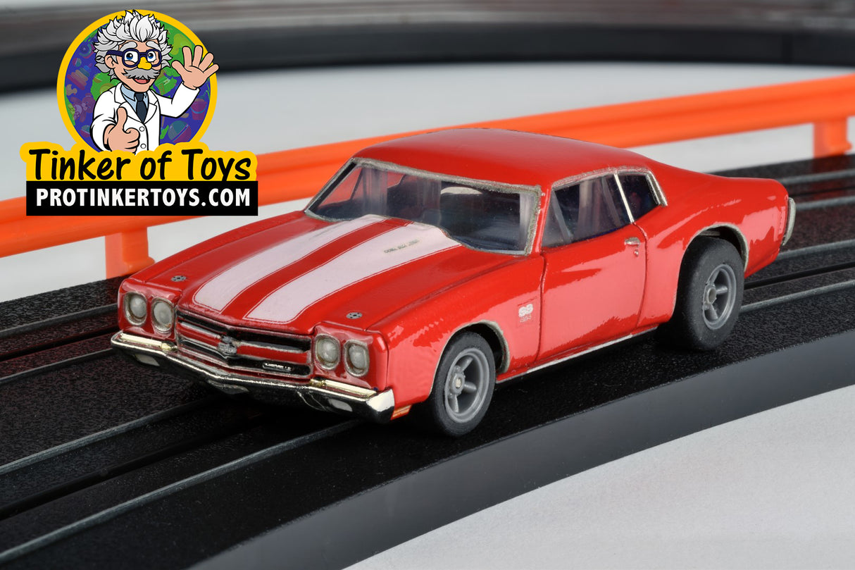 Red 1970 Chevelle 454 slot car on a track for AFX/Racemasters 22043, track view
