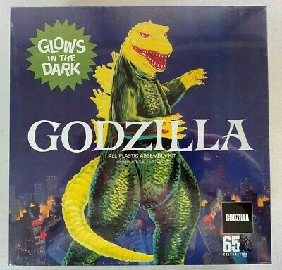 Godzilla model kit box art; glowing green monster against a dark city backdrop for Atlantis Model Co ALM466