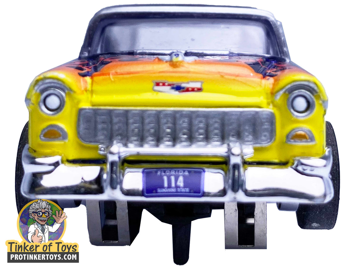 Yellow 1955 Chevrolet Nomad toy car viewed from the front for Auto World CP7780