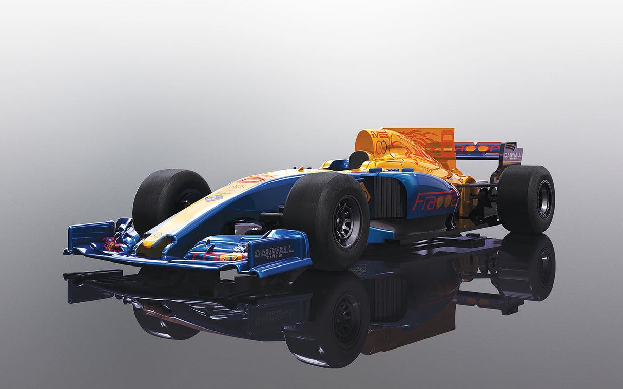 Blue and yellow race car model on a reflective surface for Scalextric C3960