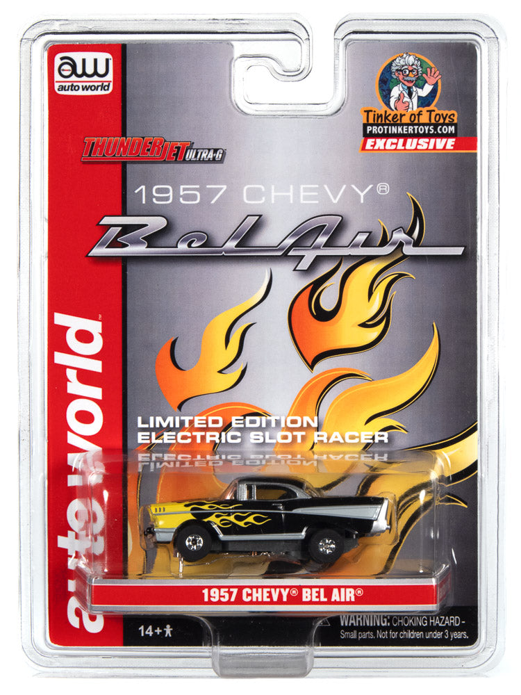 Black 1957 Chevy Bel Air slot car with yellow flame graphics for Auto World CP7818