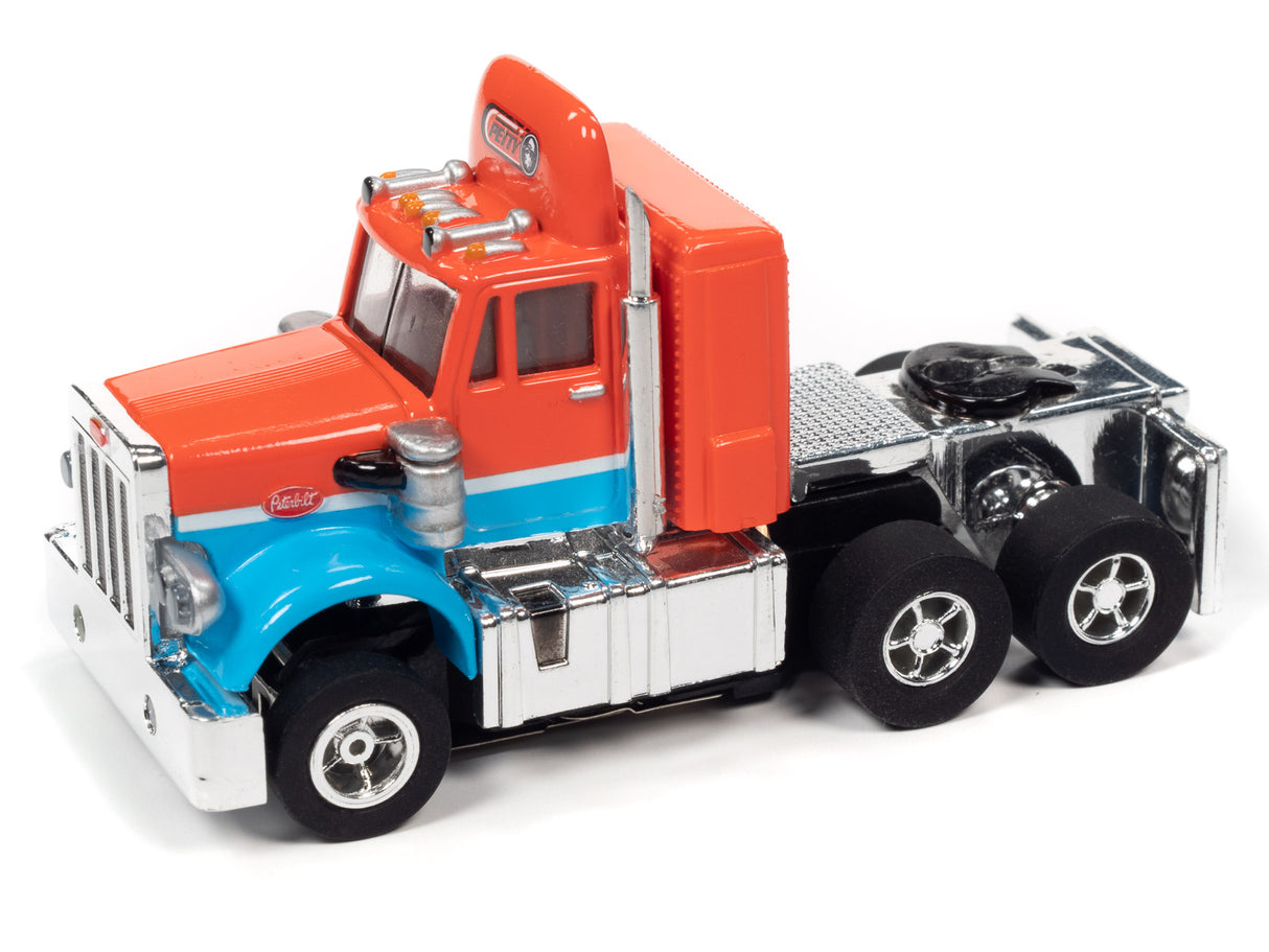 Toy slot car of a red and blue race truck and trailer for Auto World CP7900
