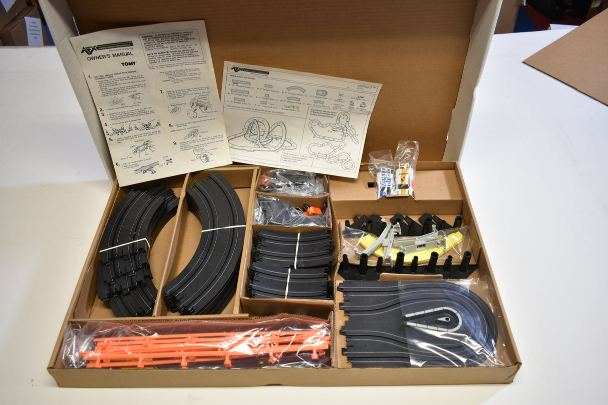 Tomy slot car set components: manuals, track pieces, and car parts for Tomy AFX AURORA 9114M