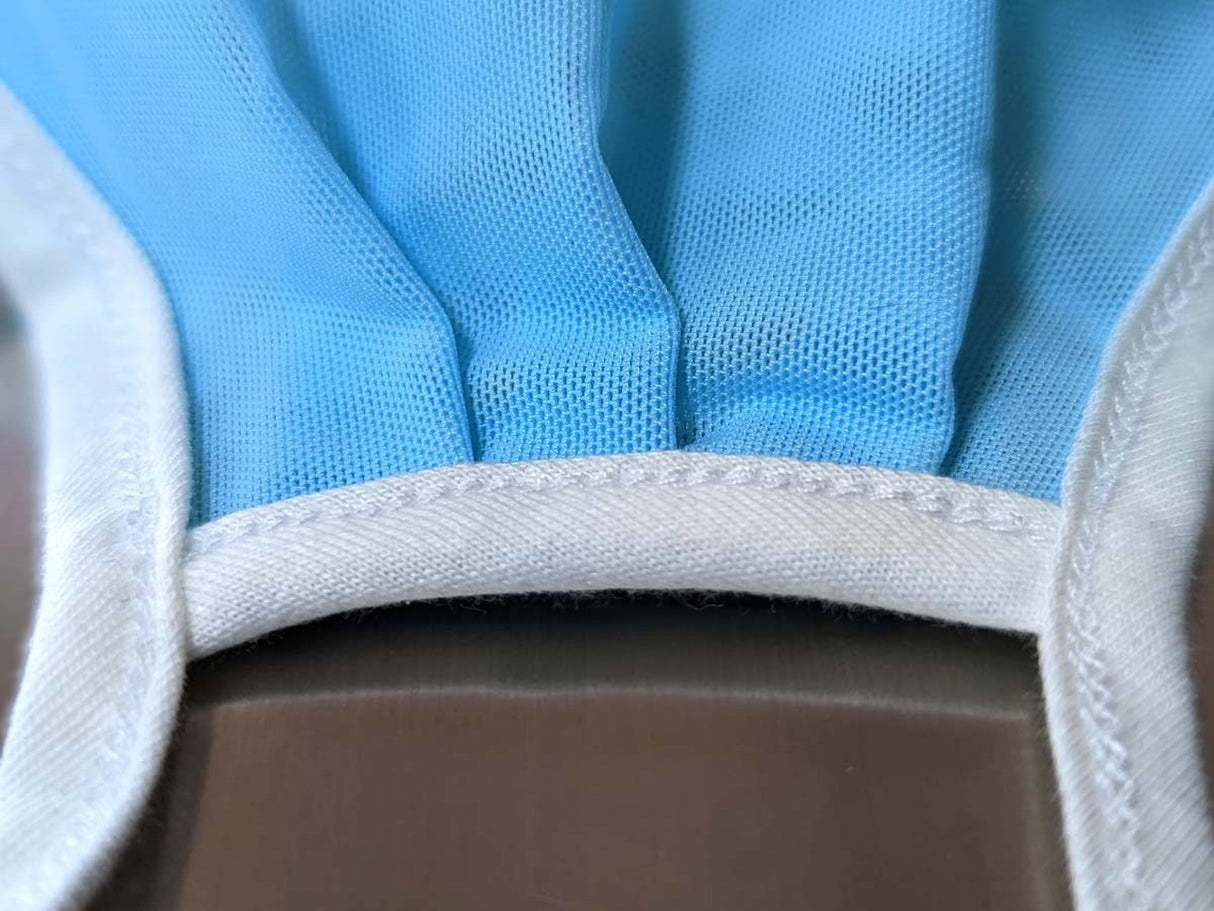 Blue disposable mask material with white elastic band detail for Fake Mask USA