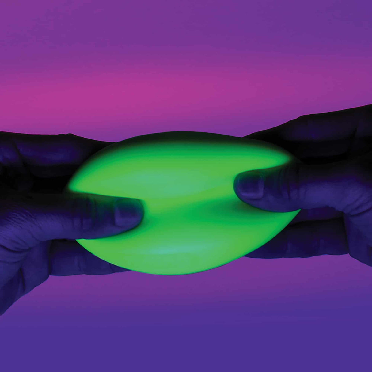 Hands holding a glowing, neon green, hourglass-shaped object against a purple background for Schylling GND