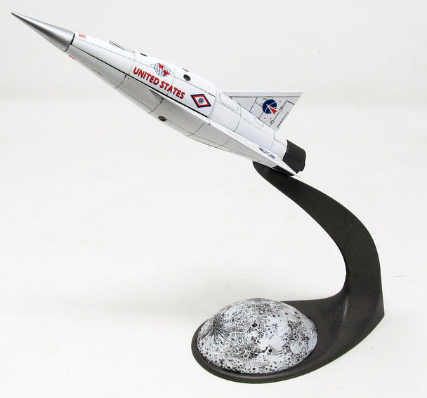 Model kit of a moon ship mounted on a black stand with a moon base for Atlantis ALM1825