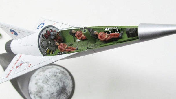 Moon ship model kit showing figures inside the fuselage for Atlantis ALM1825