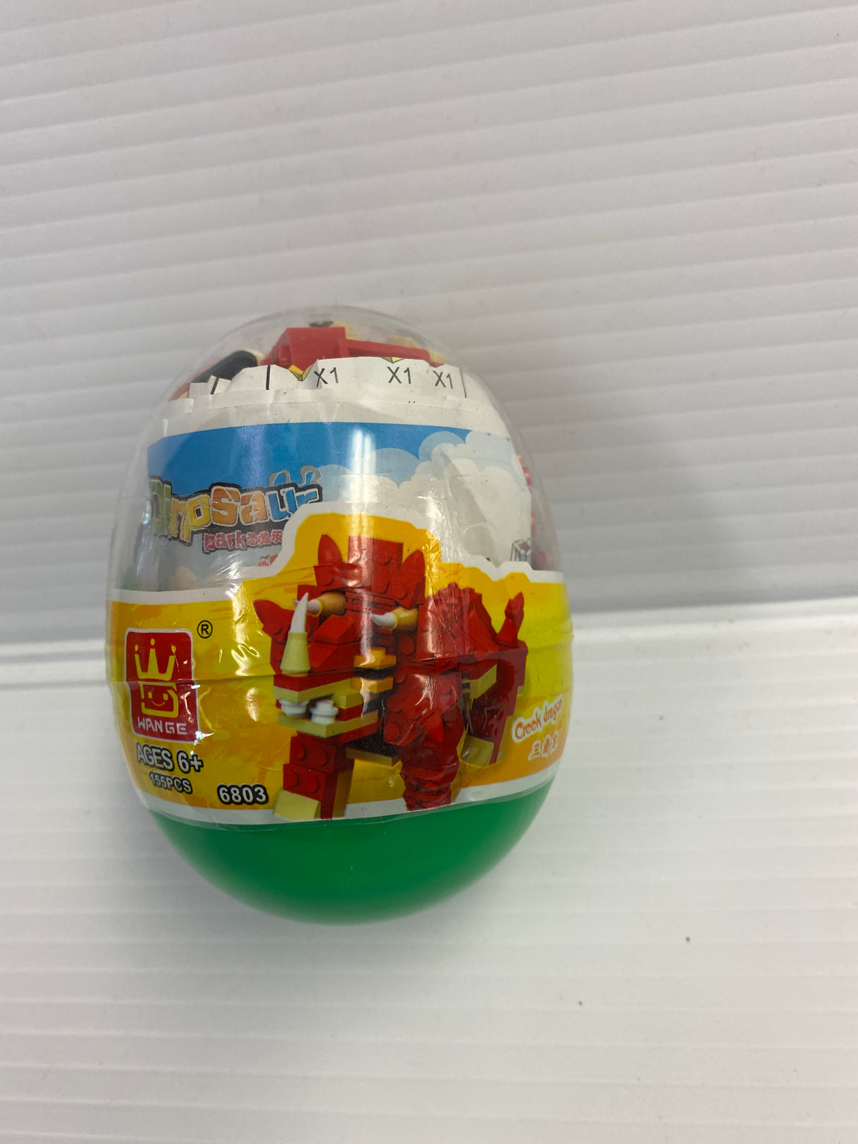 Dinosaur egg building toy with colorful, prehistoric design for IMEX Model Company WAG68016
