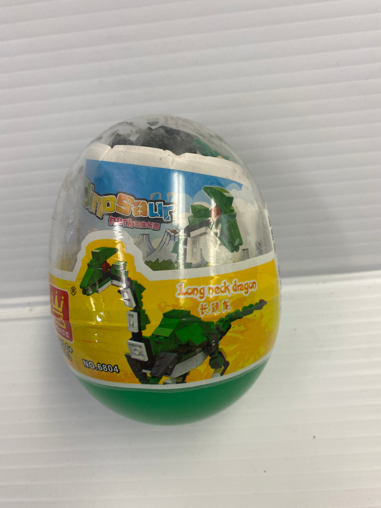Dinosaur egg toy block featuring a long-neck dragon design for IMEX Model Company WAG68016