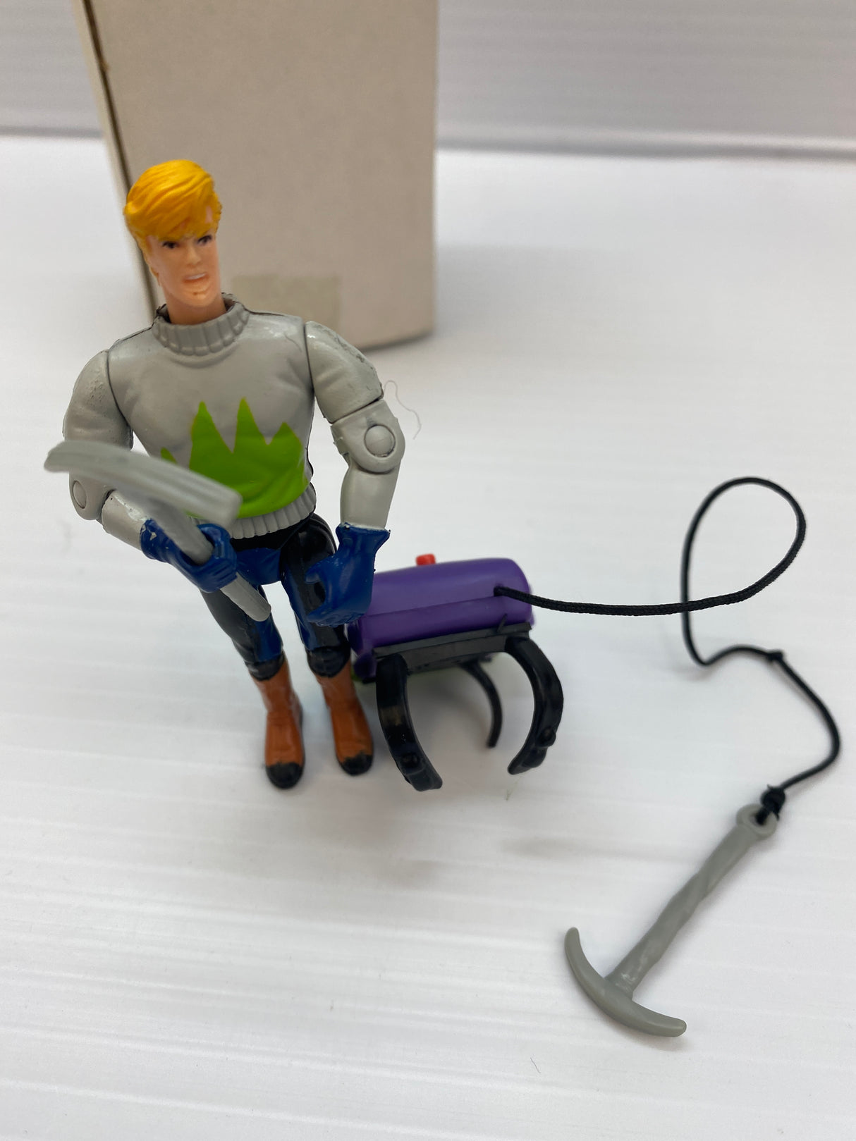 Action figure of Jonny Quest with backpack and attached grappling hook for Galoob 74843, front view