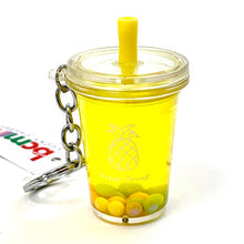 Yellow drink charm with straw and fruit accents attached to a keychain for BC Mini 12042