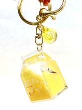 Yellow, translucent fruit milk key charm with a small yellow bead for BC Mini 12058