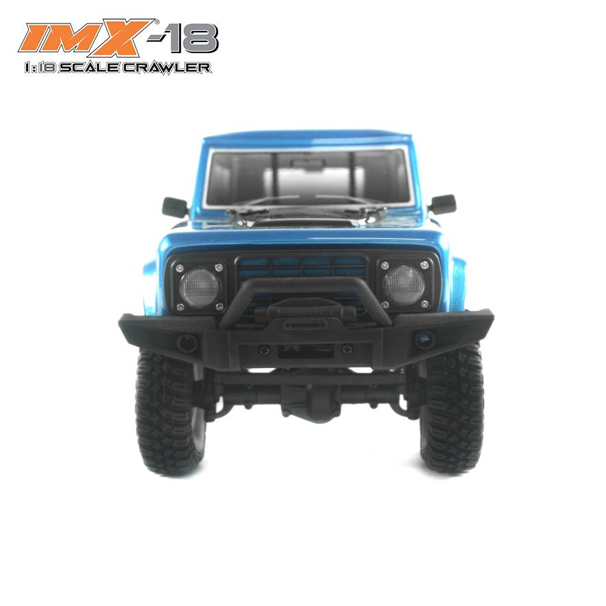 Blue 1:18 scale crawler vehicle with off-road tires and front bumper for IMX IMX25005