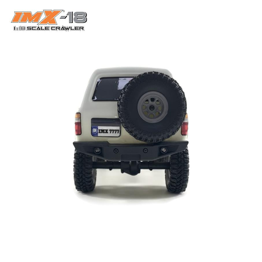 Rear view of a 1:18 scale crawler vehicle with spare tire mounted for IMX IMX25020