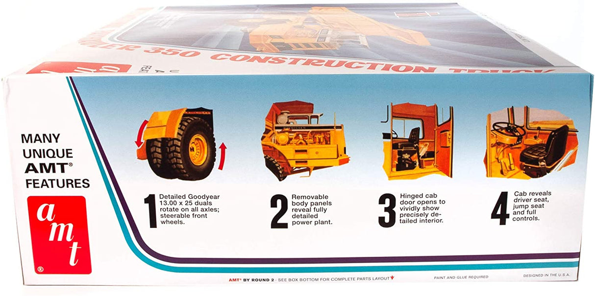 Model kit box showing features: tires, body, cab, and interior details for AMT AMT1209