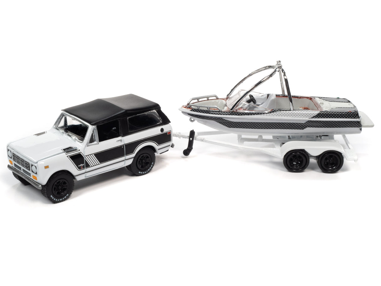 White SUV towing a boat trailer with a boat for Johnny Lightning JLBT015