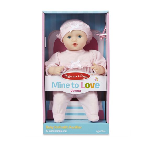 Doll wearing pink outfit, holding pacifier, displayed in box for Melissa and Doug 4881