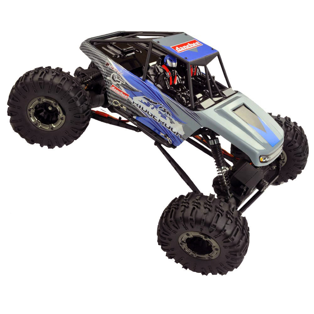Remote control crawler with large off-road tires and exposed suspension for RedCAT Danchee Ridgerock