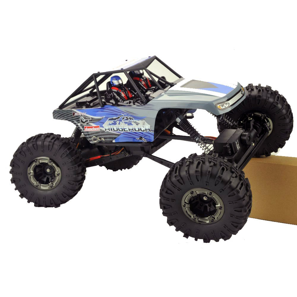 Remote control crawler with large off-road tires and open roll cage for RedCAT Danchee Ridgerock, side view