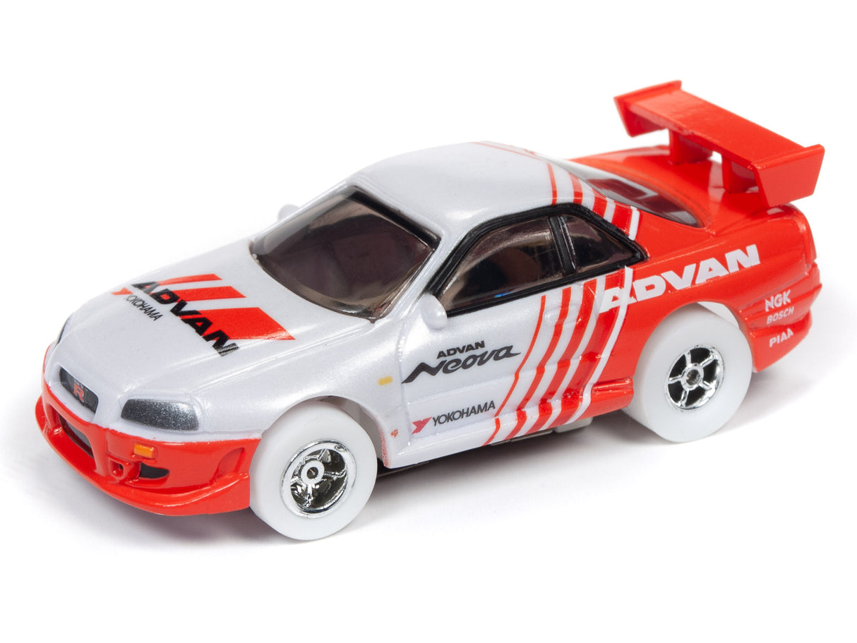 White and red race car toy with "ADVAN" lettering for Auto World SC346